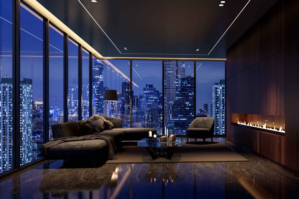 Luxury living room at night with city skyline views through floor-to-ceiling windows