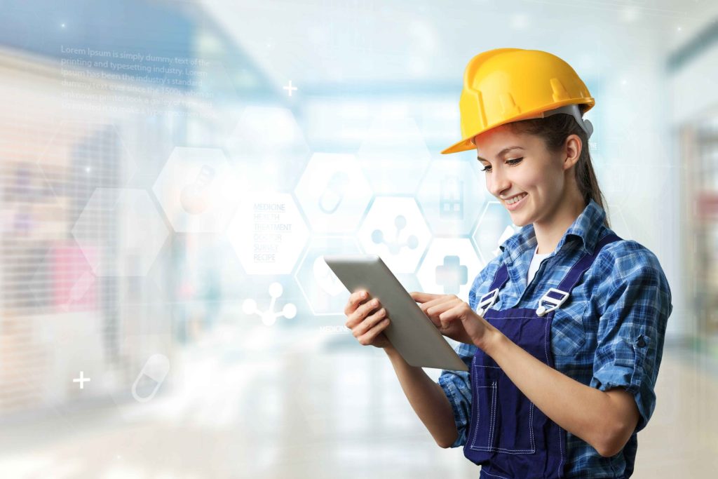 Technician using a tablet for digital system setup and on-site control