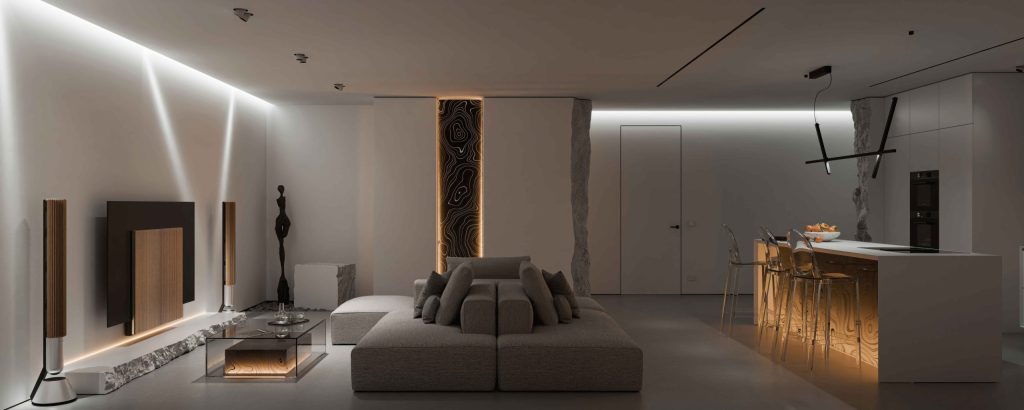 Modern luxury living room with integrated lighting, large speakers, and a minimalist interior design