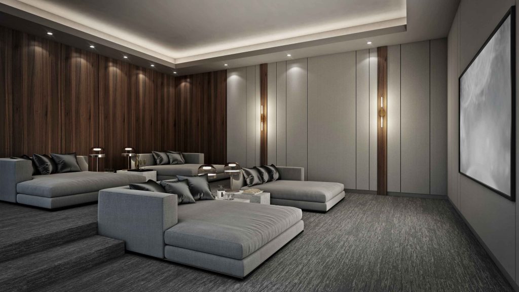 Luxury home theater with a large projection screen, lounge seating, and ambient cove lighting