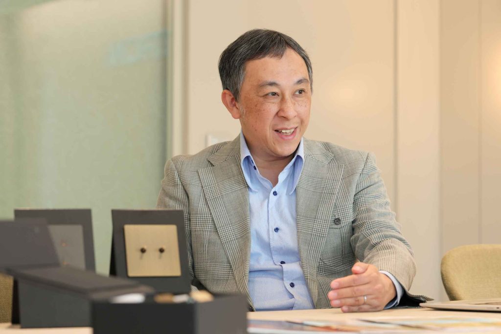 Munetaka Tanizaki speaking during an interview