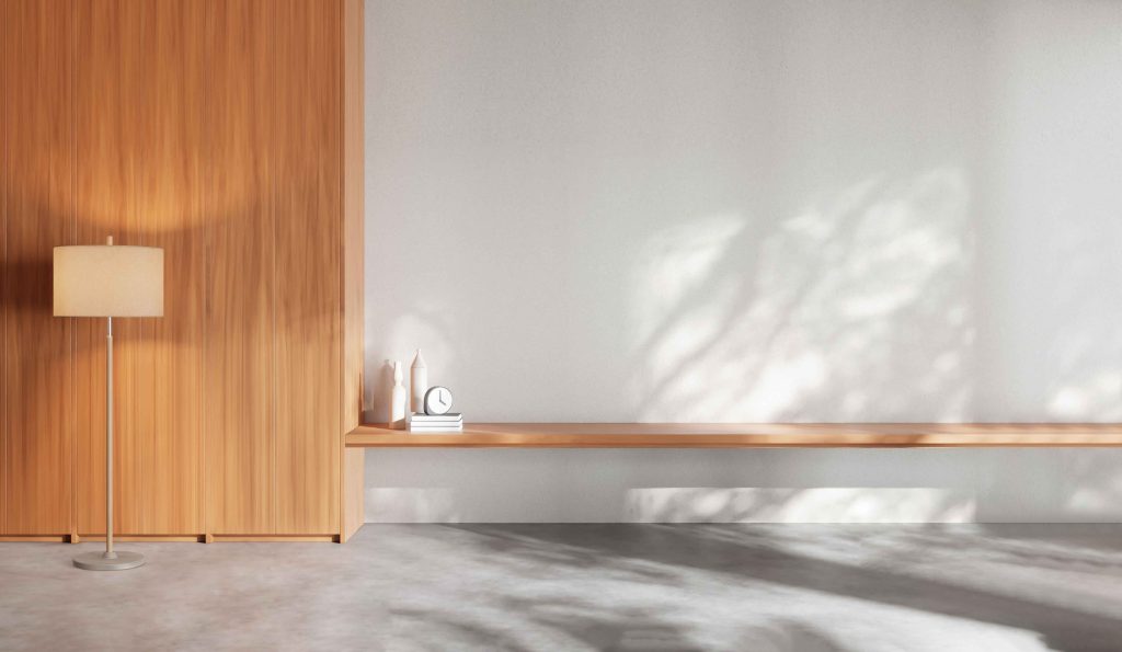 Minimal interior with wooden wall, bench, and soft daylight shadows