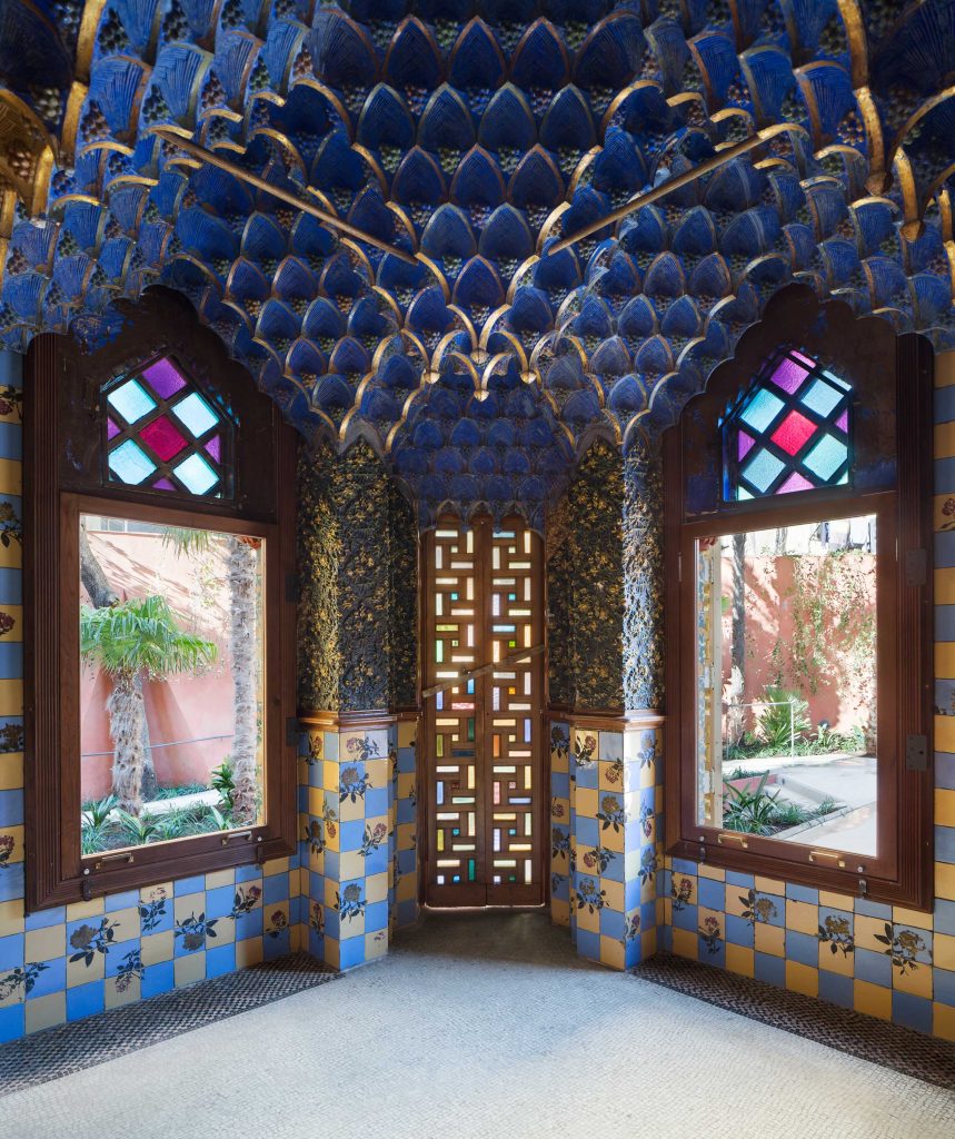 Casa Vicens smoking room with blue ornamental ceiling and stained glass by Antoni Gaudi