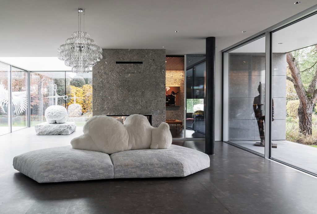 White Edra Pack polar bear sofa in a contemporary luxury residence with modern art