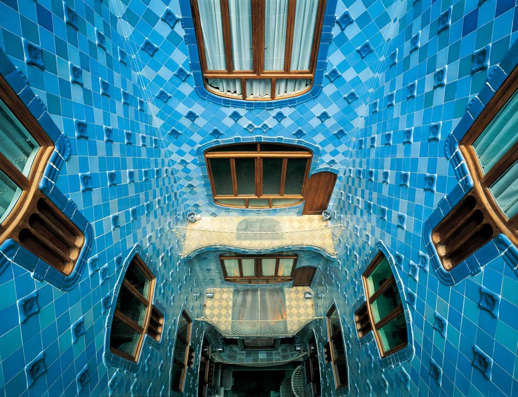 Casa Batllo blue-tiled light well designed by Antoni Gaudi